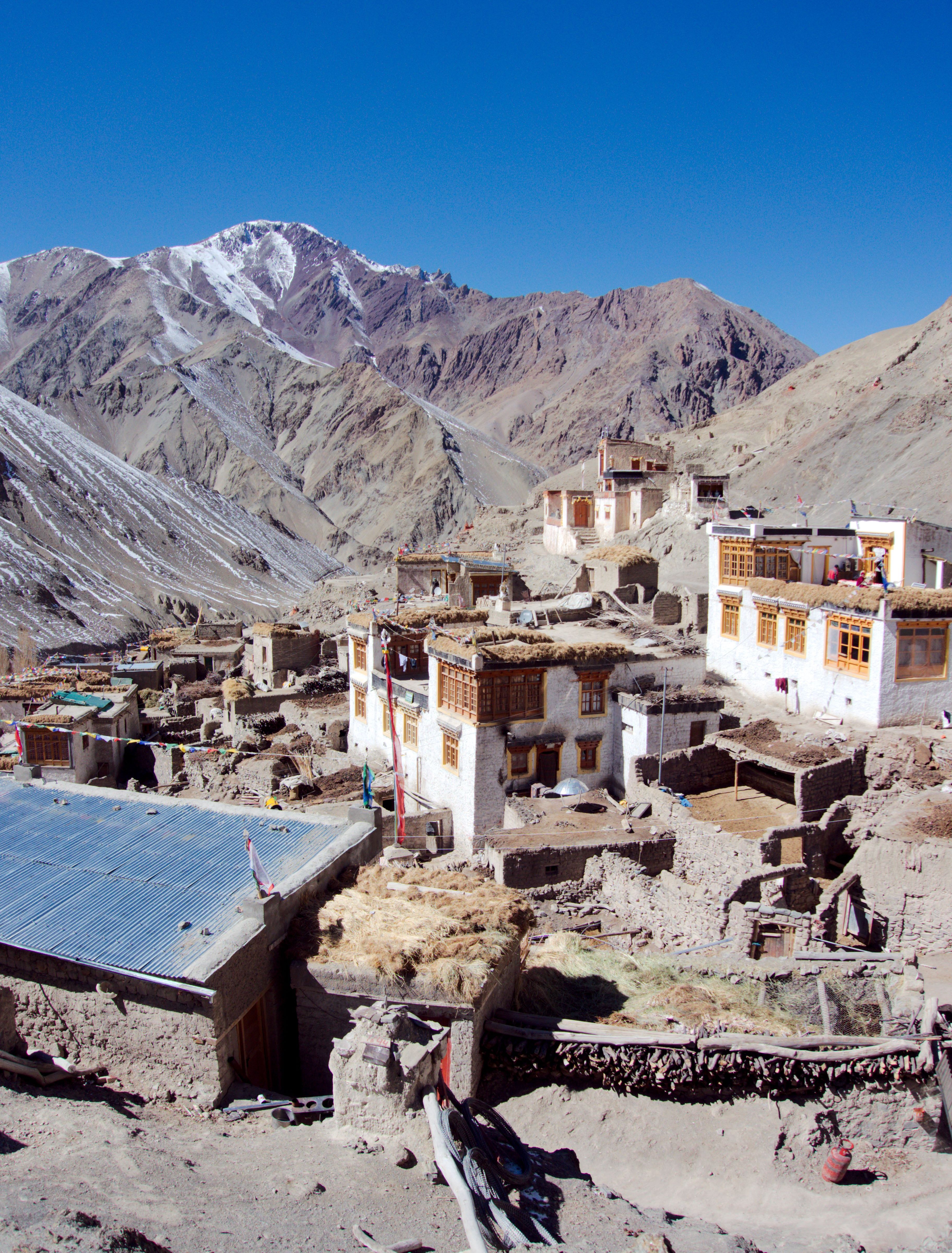 Whitewashed houses in Rumbak beneath Ladakh’s rocky mountain slopes