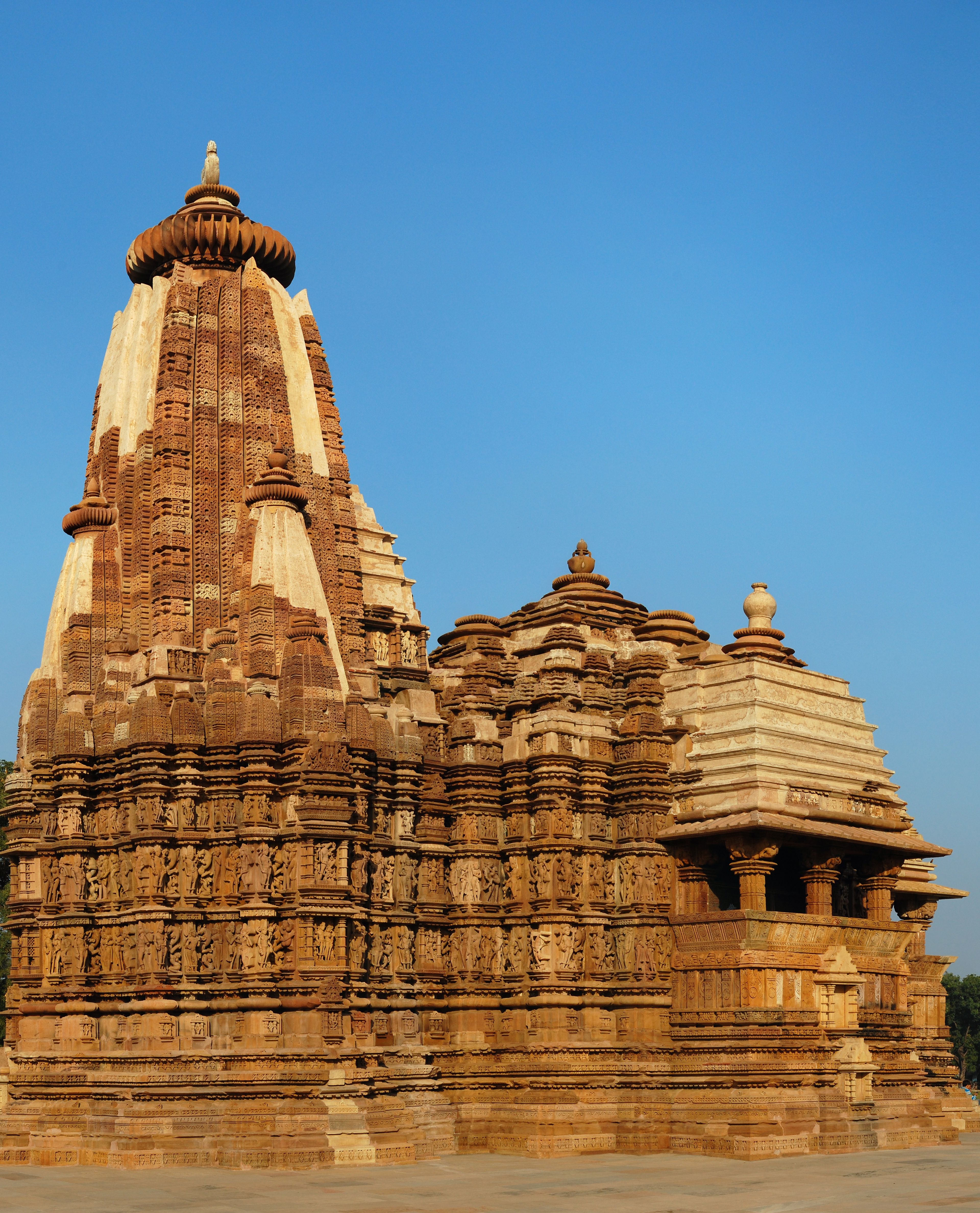 The carved sandstone tower and walls of Devi Jagadambi Temple at Khajuraho