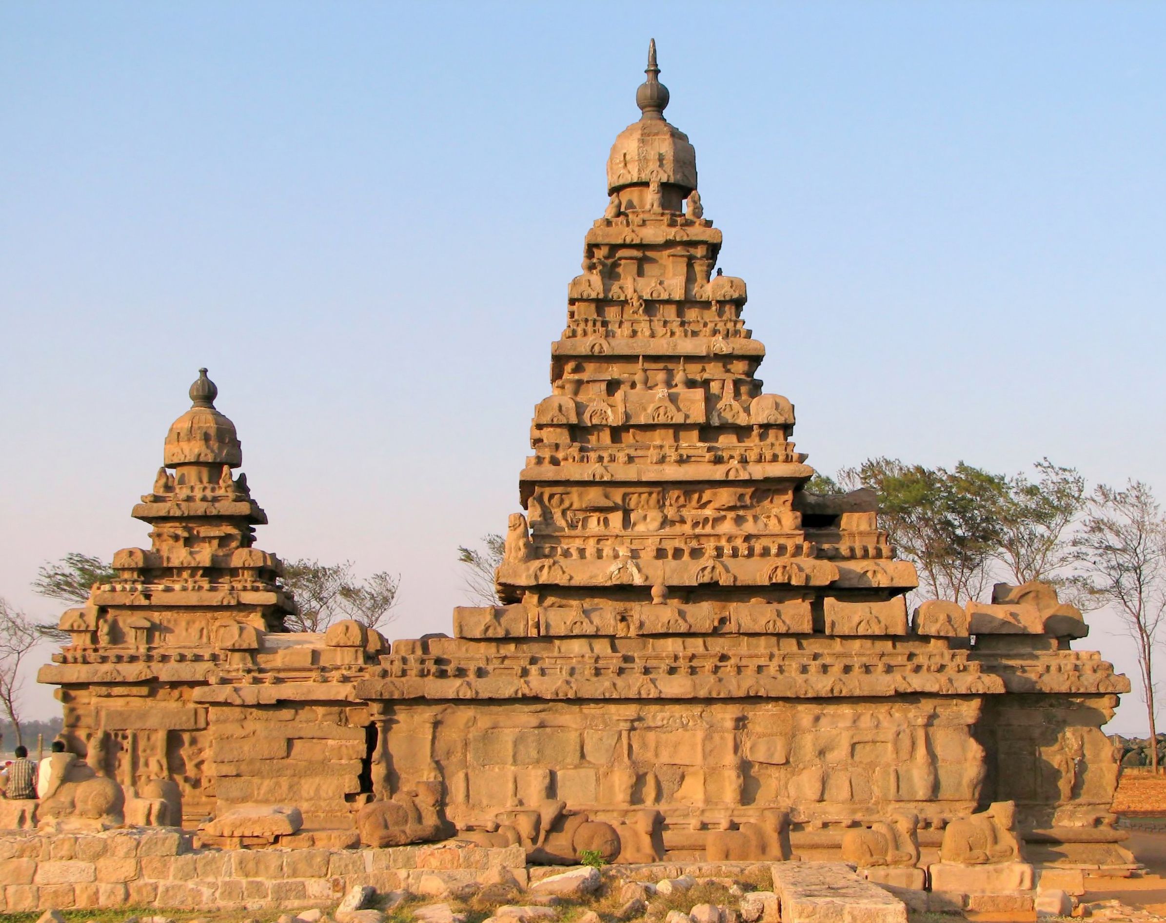 The sandstone towers of the Shore Temple at Mahabalipuram against a clear sky