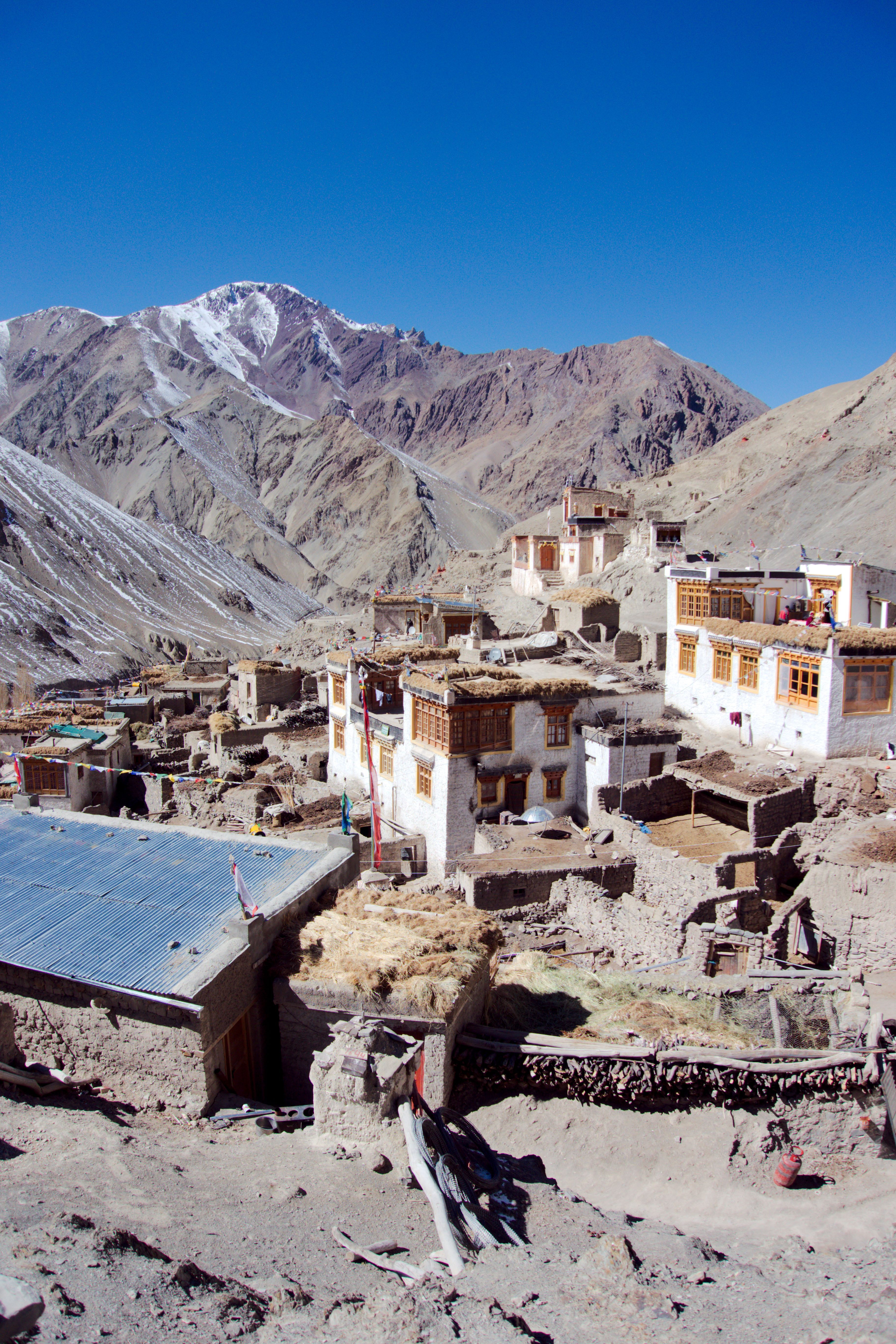 Whitewashed houses in Rumbak beneath Ladakh’s rocky mountain slopes