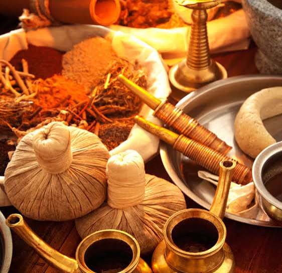 Herbal compresses and oils prepared for a wellness treatment