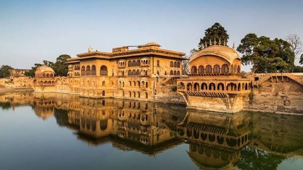 A palace reflected in a lake