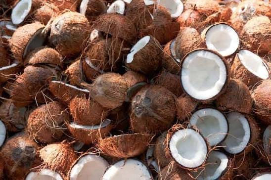 Halved coconuts piled together