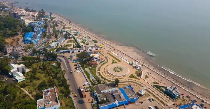 Aerial view of a seaside promenade and the beach beyond