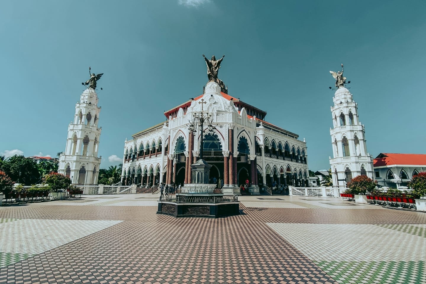 A white church facade facing an open courtyard