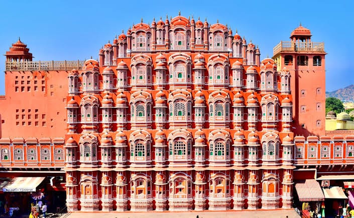 The pink facade and many windows of Jaipur's Hawa Mahal