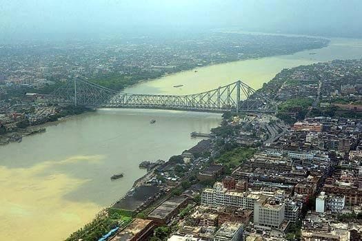 Aerial view of Howrah Bridge spanning the Hooghly River