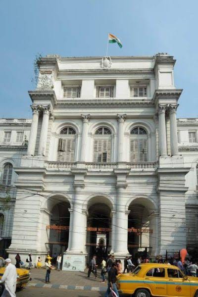 The arched entrance and white facade of the Indian Museum