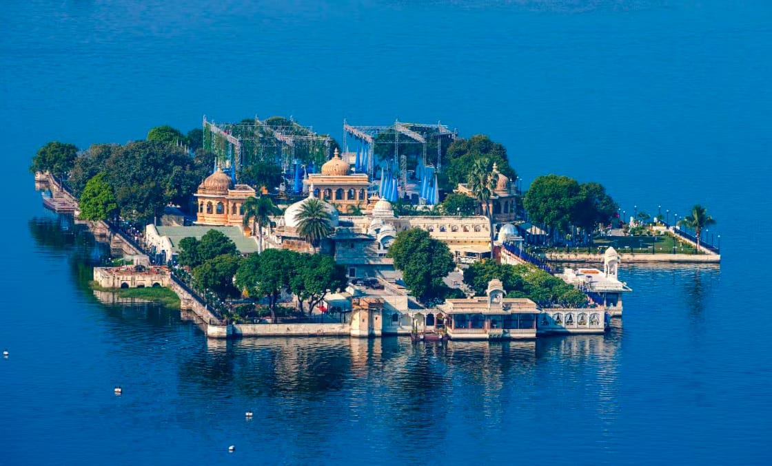 A palace island surrounded by blue lake water