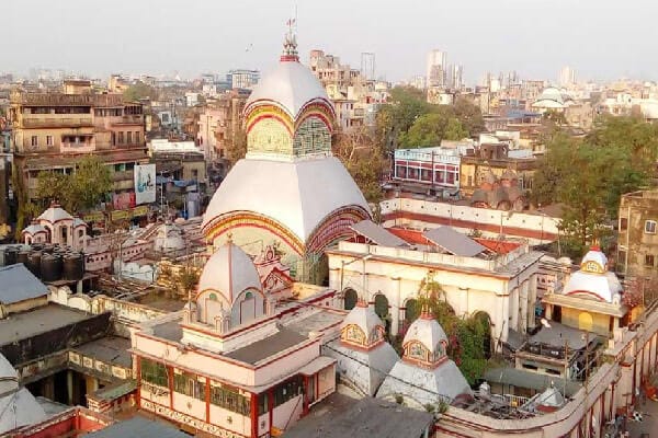 Aerial view of a temple surrounded by Kolkata buildings