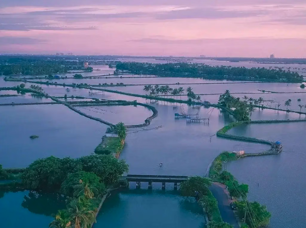 Aerial view of flooded fields and waterways at dusk