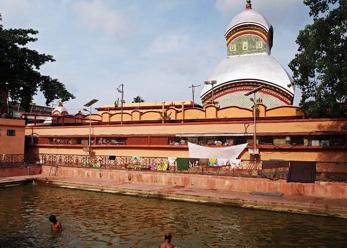 A temple courtyard beside a reflecting pool