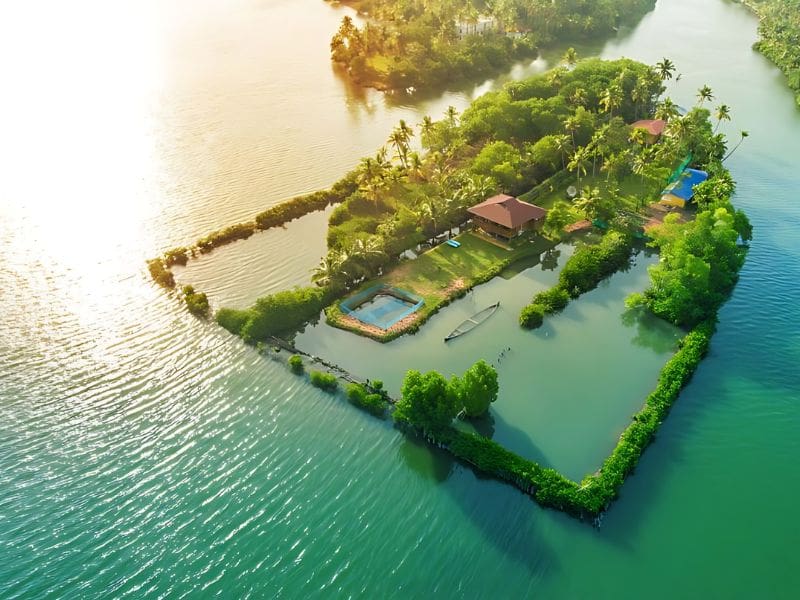 Aerial view of a small island surrounded by calm water