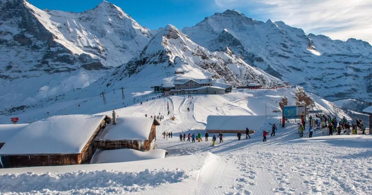 A snowy mountain resort beneath jagged peaks