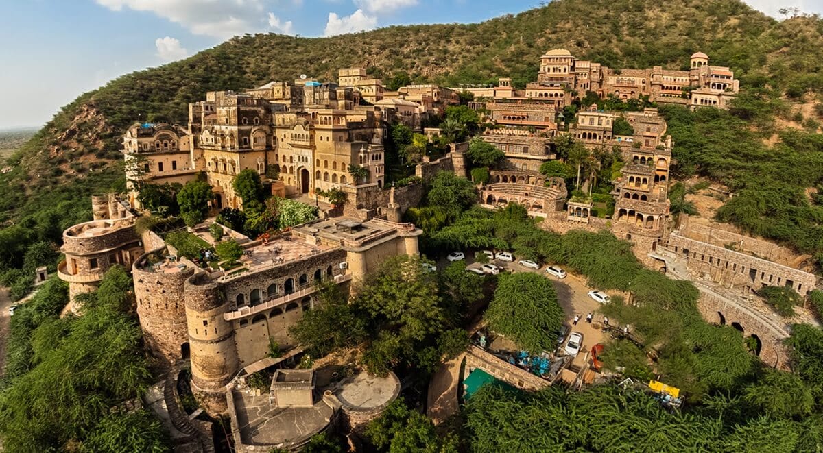A hilltop fort hotel with terraces along its walls