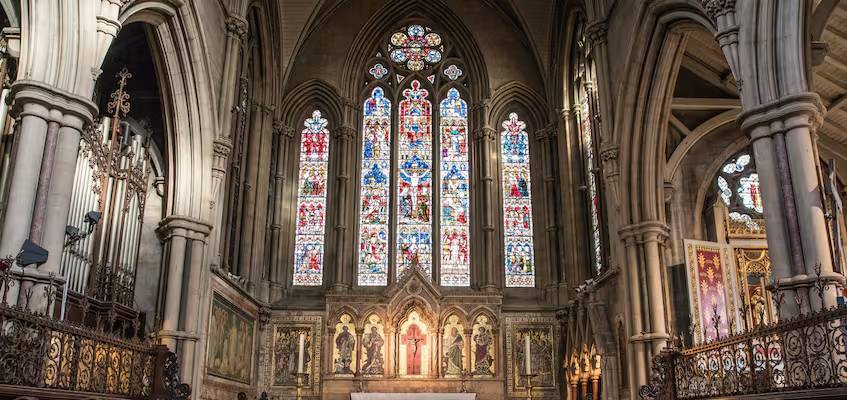 Stained-glass windows above the cathedral altar