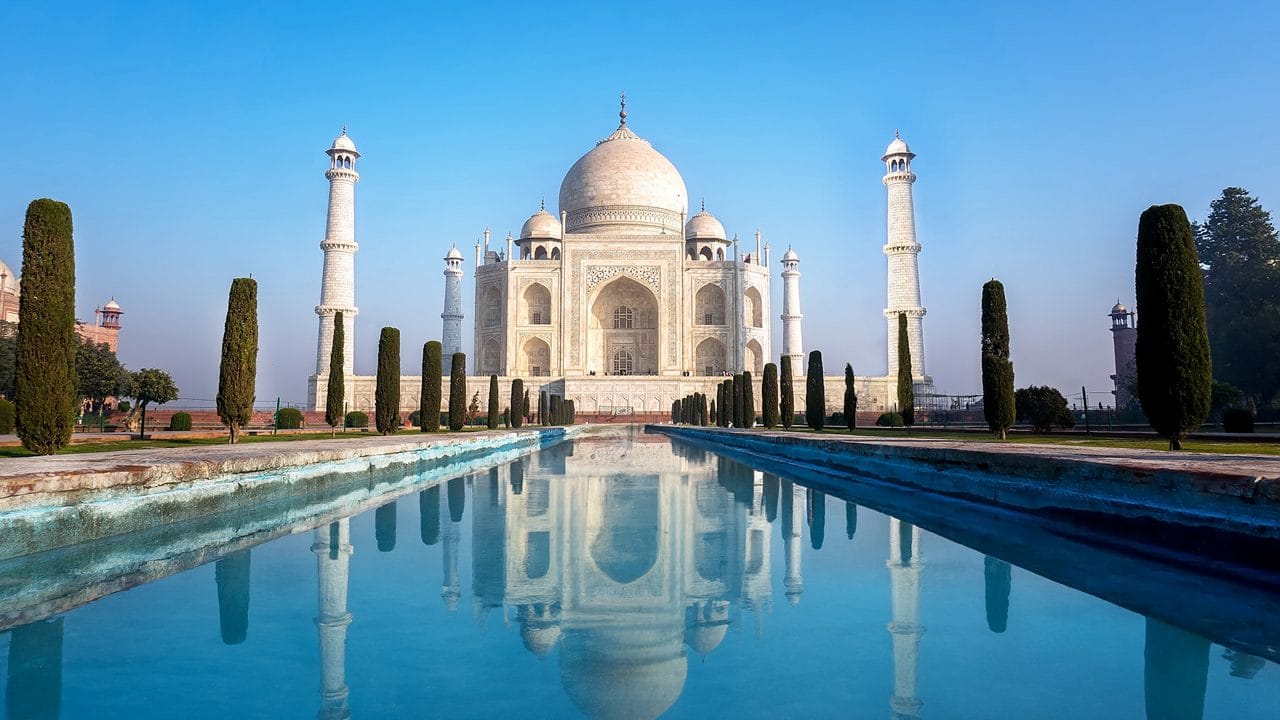 The Taj Mahal reflected in its long garden pool