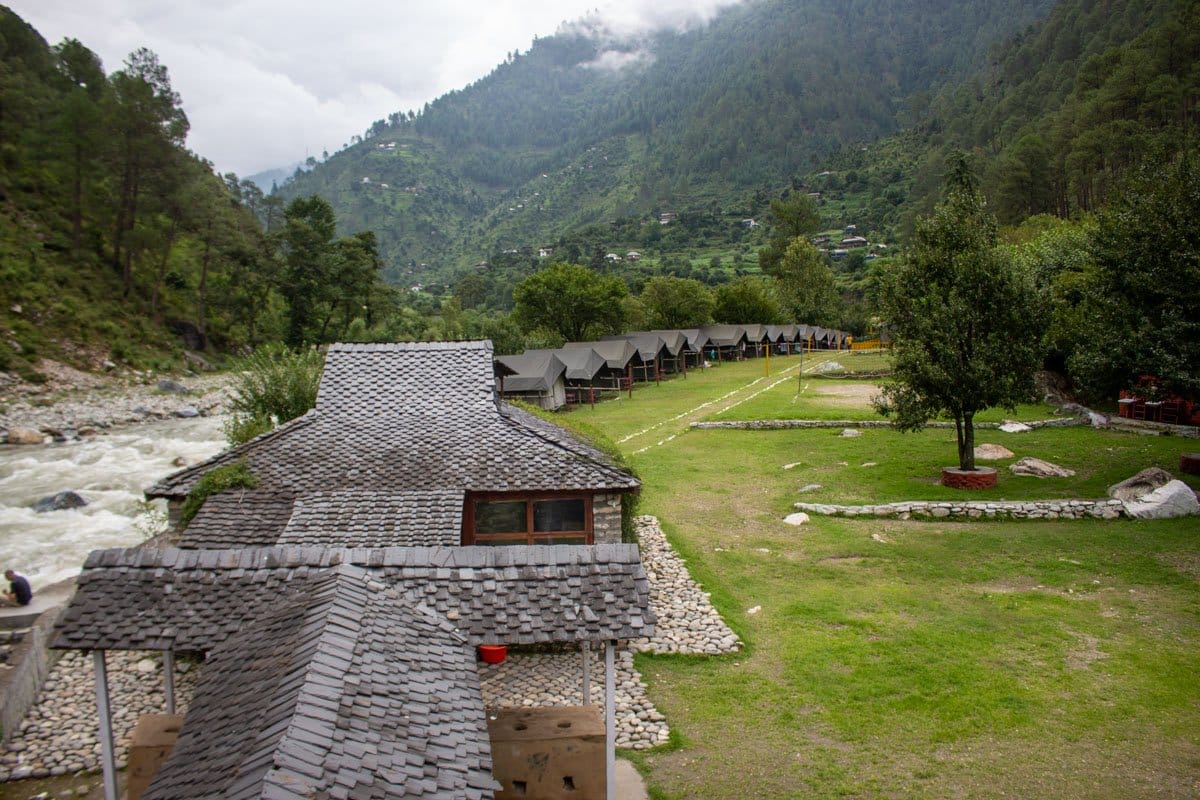 A row of cottages beside a mountain river